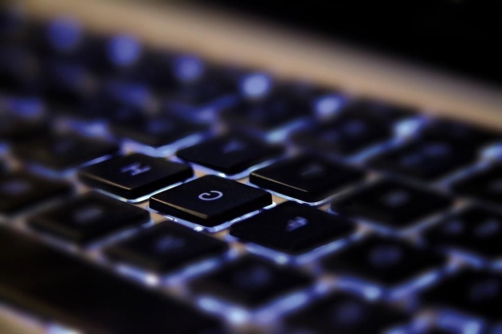 Professional technology consultants reviewing quantum computing implementations